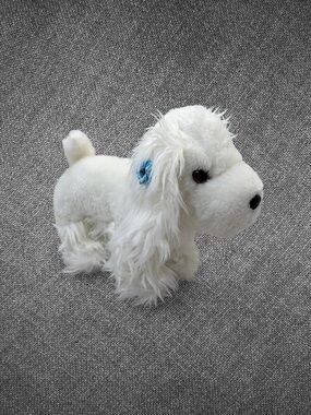 White Fluffy Plush Dog With Blue Bow